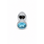 Silver anal plug, blue brick and stone