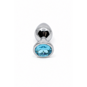 Silver anal plug, blue brick and stone