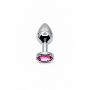 Silver anal plug in red brick and stone